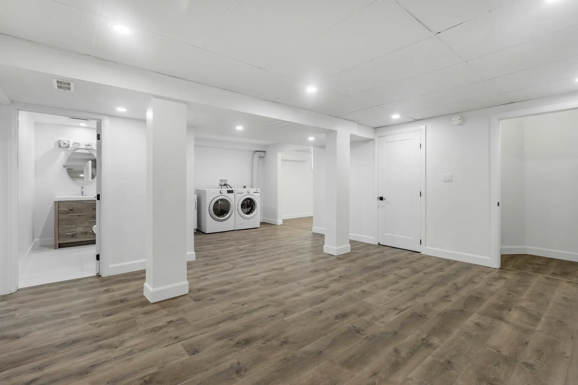 Modern laundry room in spacious basement